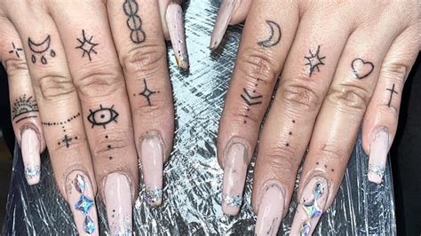 fingers touching tattoo meaning|finger tattoo before and after.